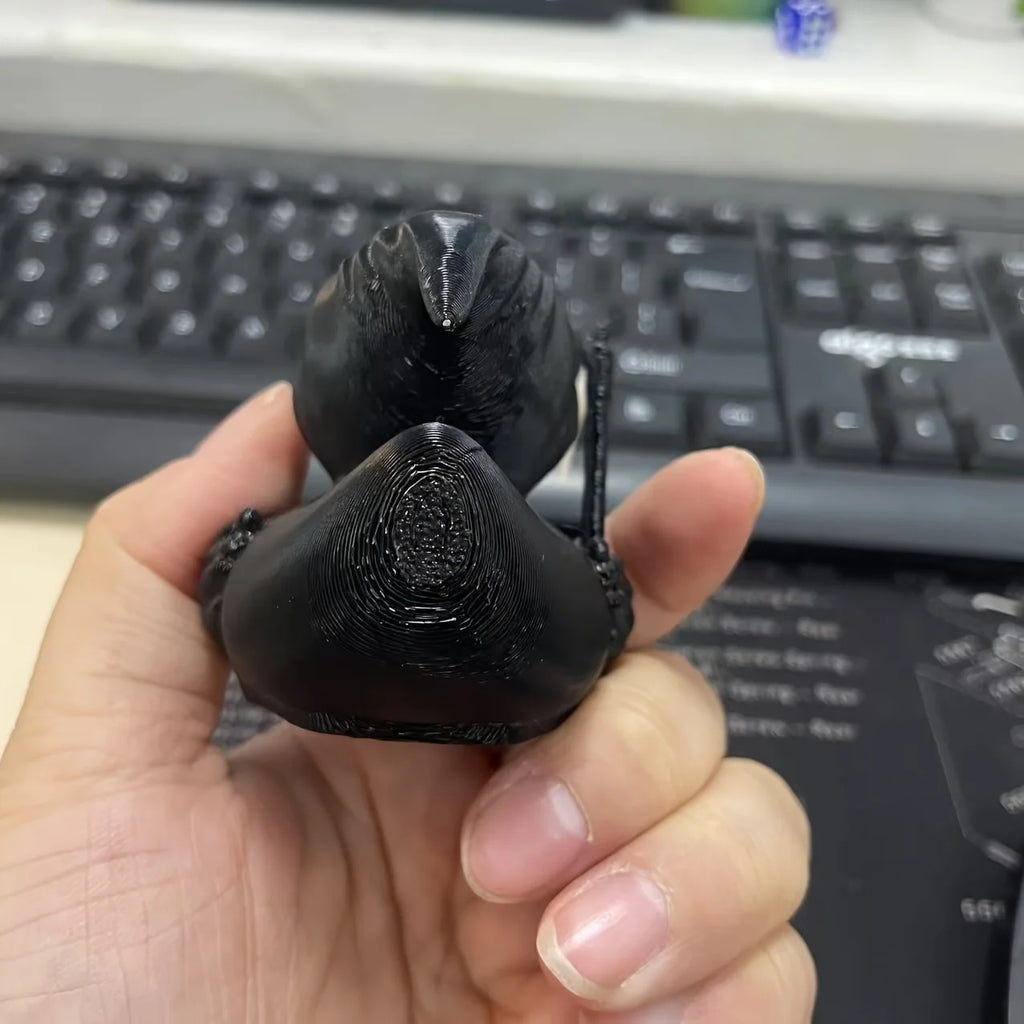 Figurine Canard Faucheuse Noire et Blanche avec Faux