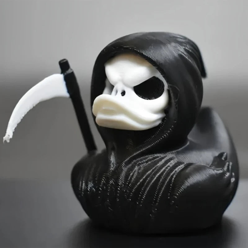 Figurine Canard Faucheuse Noire et Blanche avec Faux